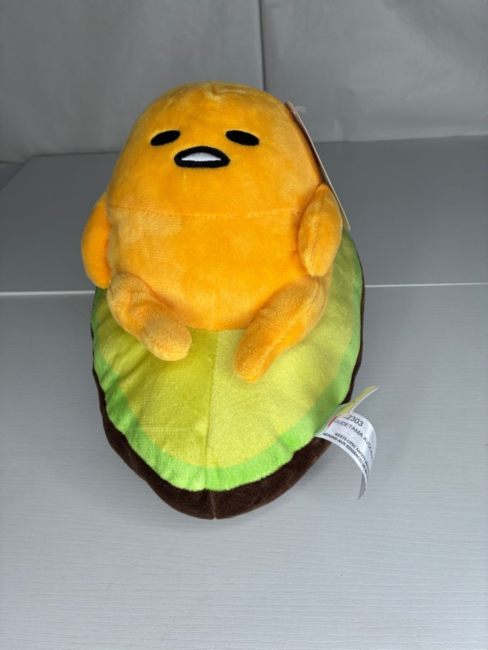 Sanrio Gudetama Plush in Yellow & Green with Brown Base